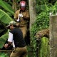 The leopard prepares to attack a forest guard, left, at Prakash Nagar village near Salugara, on the outskirts of Siliguri, India.